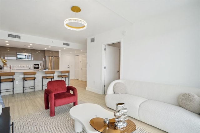 living room with light wood-type flooring