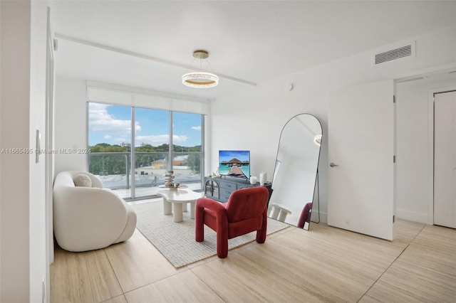 living room with light hardwood / wood-style floors