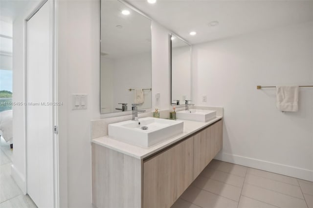 bathroom with vanity and tile patterned floors