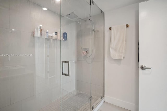 bathroom featuring an enclosed shower