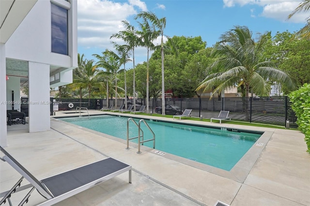 view of pool featuring a patio area