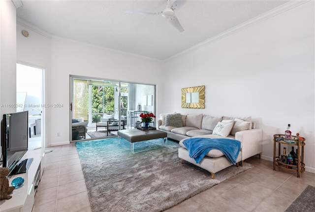 living room with light tile patterned floors, ornamental molding, and ceiling fan