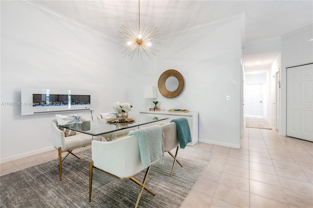 tiled dining room with ornamental molding and a chandelier