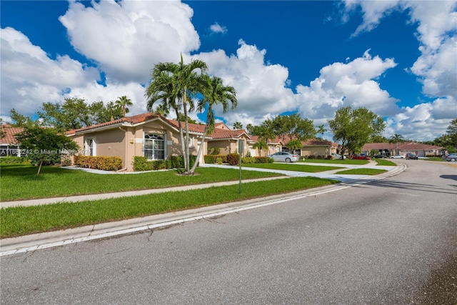 view of front of home with a front lawn