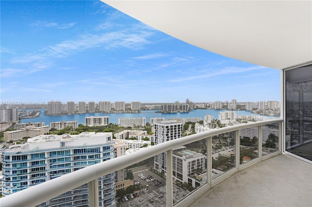 balcony featuring a water view