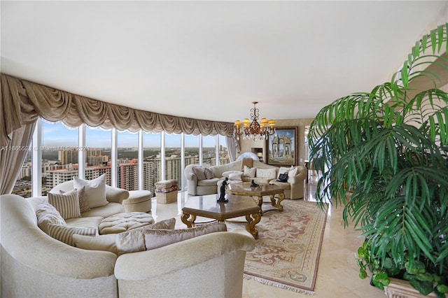 living room with an inviting chandelier and light tile patterned floors