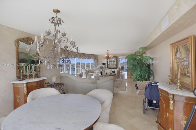 dining space featuring a notable chandelier