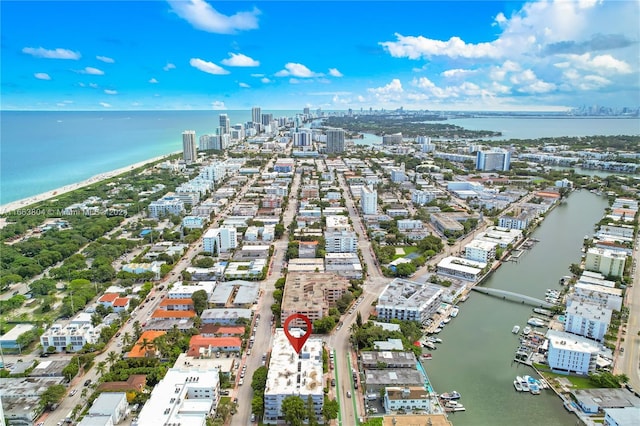 bird's eye view with a water view