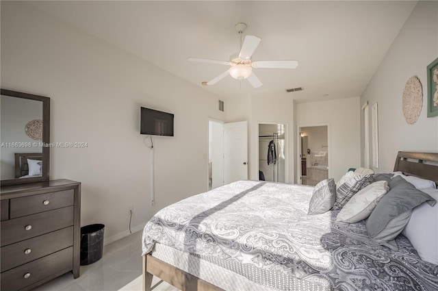 bedroom with connected bathroom, a walk in closet, ceiling fan, and a closet