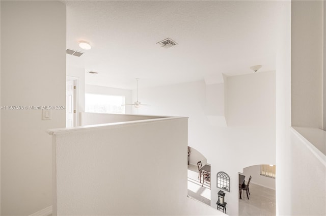 bathroom featuring ceiling fan