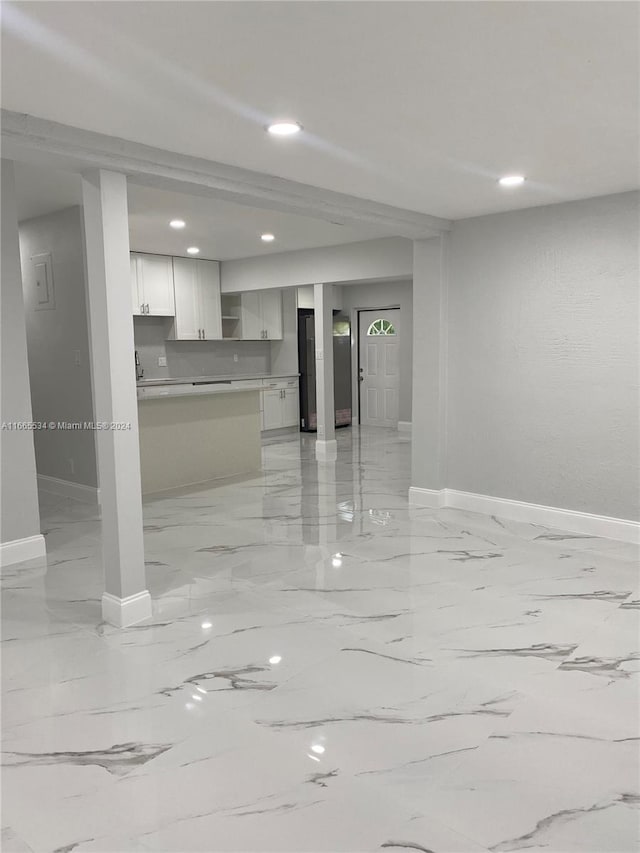 interior space featuring white cabinets