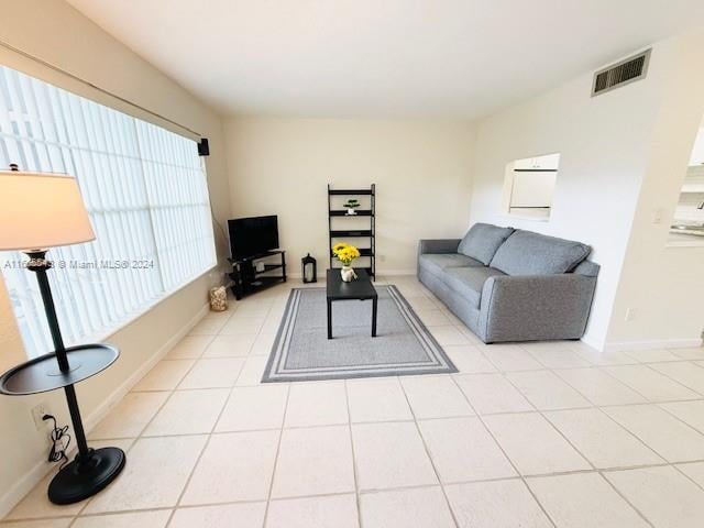 living room featuring light tile patterned floors