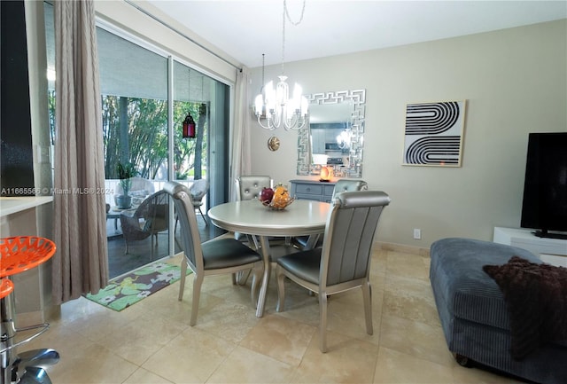 tiled dining room with an inviting chandelier