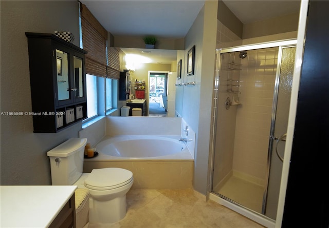 full bathroom with independent shower and bath, vanity, toilet, and tile patterned floors