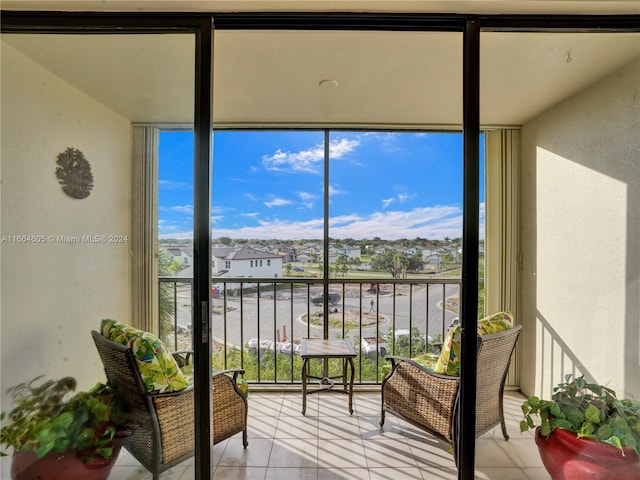 sunroom with a water view