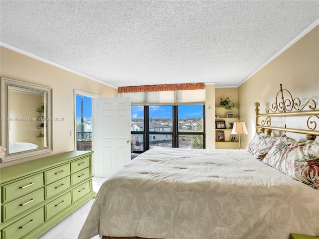 bedroom with ornamental molding, multiple windows, and a textured ceiling