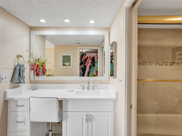 bathroom with shower with separate bathtub and vanity