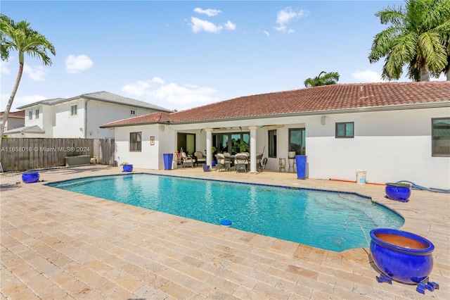 view of pool featuring a patio