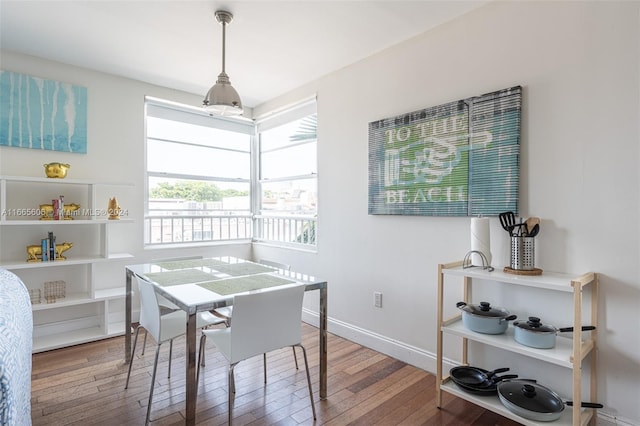 dining area with hardwood / wood-style flooring