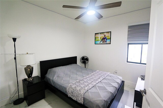 bedroom featuring ceiling fan