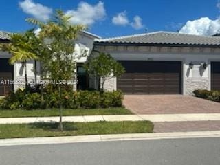 view of front of home with a garage