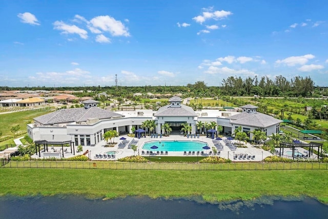 birds eye view of property featuring a water view