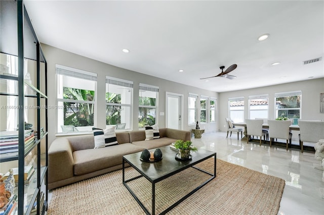 living room with ceiling fan