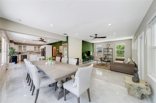 dining space featuring ceiling fan