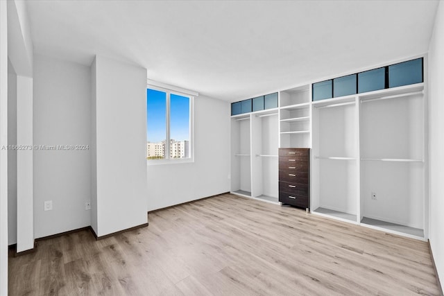 unfurnished bedroom with light hardwood / wood-style flooring