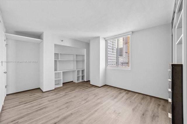 unfurnished bedroom featuring light hardwood / wood-style flooring