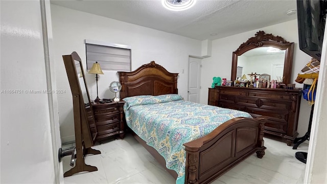 bedroom with a textured ceiling