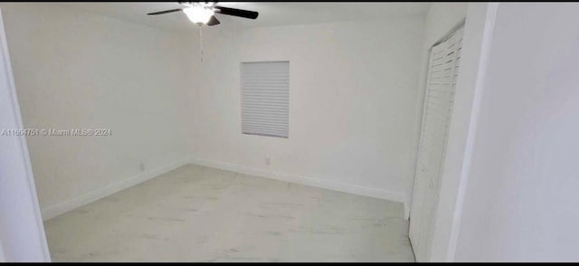 empty room featuring ceiling fan