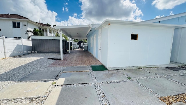 view of home's exterior with a patio