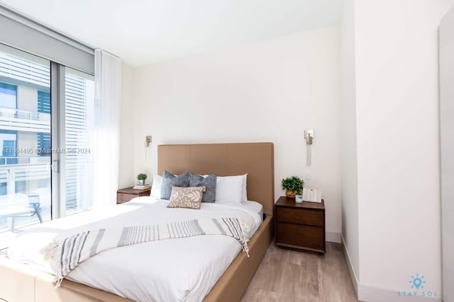 bedroom featuring light wood-type flooring