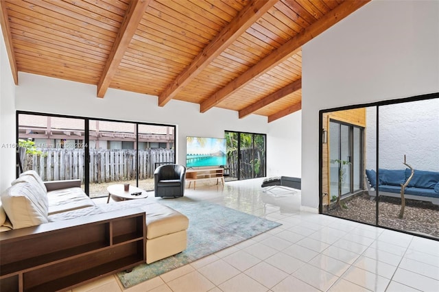 living room featuring wood ceiling, lofted ceiling with beams, and light tile patterned floors