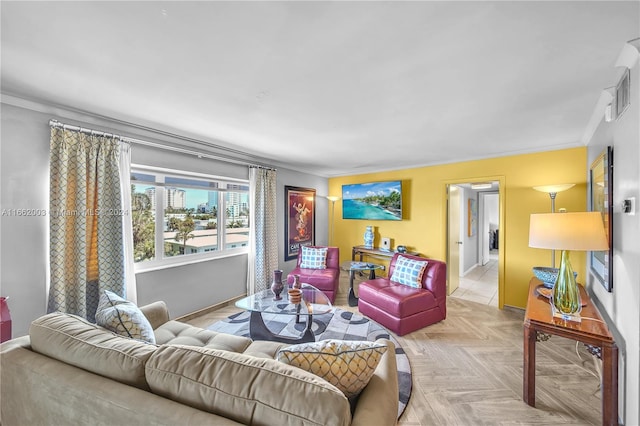 living room featuring light parquet floors and ornamental molding