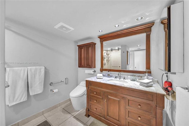 bathroom featuring tile patterned floors, walk in shower, vanity, and toilet