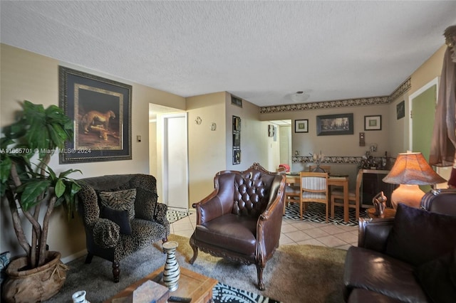 tiled living room with a textured ceiling