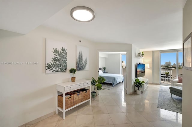 hallway with light tile patterned flooring