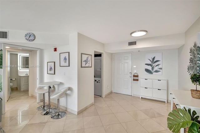 entrance foyer with light tile patterned floors