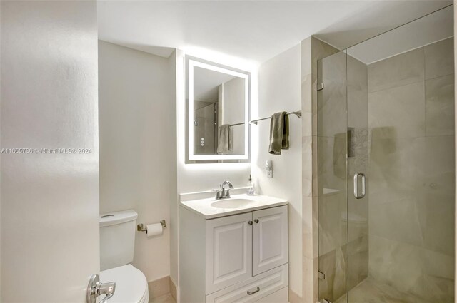 1621 Bay Rd Unit 1105, Miami Beach, FL 33139 - full bath with a stall shower, vanity, and toilet