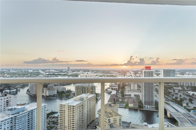 balcony at dusk with a water view