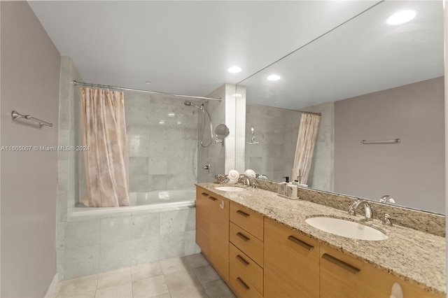 bathroom featuring shower / tub combo, vanity, and tile patterned floors