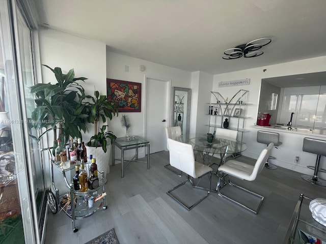 dining space featuring wood-type flooring