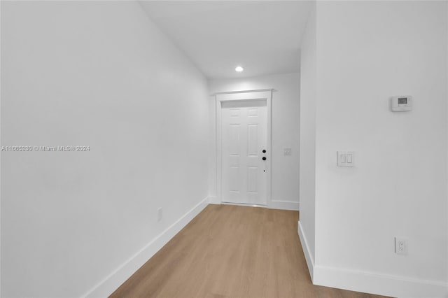 hallway featuring light hardwood / wood-style floors