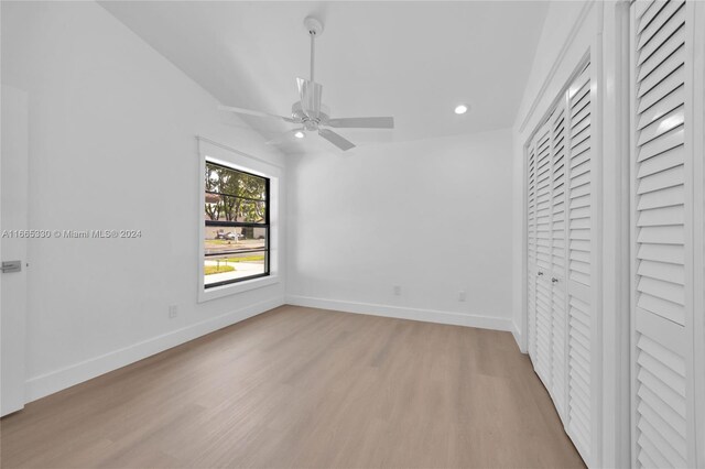 unfurnished bedroom with light wood-type flooring and ceiling fan