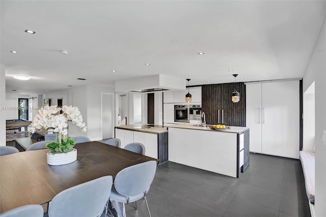 dining space with sink