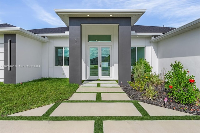 back of house featuring french doors