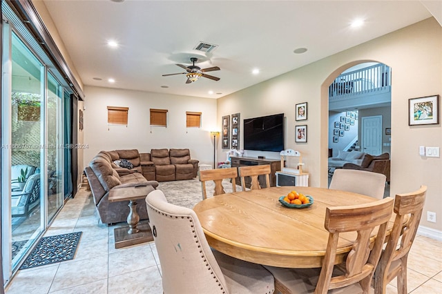 dining room featuring ceiling fan and light tile patterned floors