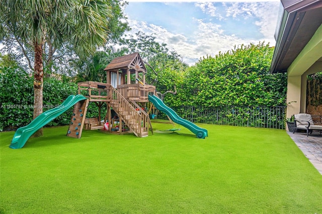 view of play area with a yard